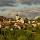 Photo du village de Chaumont et de son clocher sous un ciel de printemps