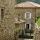 Photographie d'une ruelle et de maisons en pierres à Saint Pierreville en Ardèche