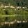 Photographie du village et du lac de Saint Martial en été - Ardèche