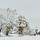 Photo du village de Chaumont sous la neige d'automne en Haute Savoie