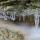 Image de stalactites de glace au dessus de l'eau courante dans la rivière du Fornant - Haute Savoie