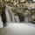 Photo d'une petite cascade au milieu des glaçons dans le torrent du Fornant en Haute Savoie