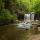 Photo de la vallée du Herssion verdoyante autour de la cascade du Gour Bleu