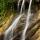 Photographie d'une petite cascade sur les bords de la rivière du Chéran en été