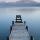 Photographie d'un ponton sur le lac d'Annecy avec vue sur les montagnes