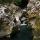 Photo d'une petite cascade entre les rochers dans la rivière du Fornant