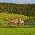 Photographie du village de Grande Rivière sur les bords du lac de l'Abbaye