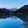 Photographie de l'heure bleue sur le lac de Vallon et la montagne du Roc d'Enfer à Bellevaux