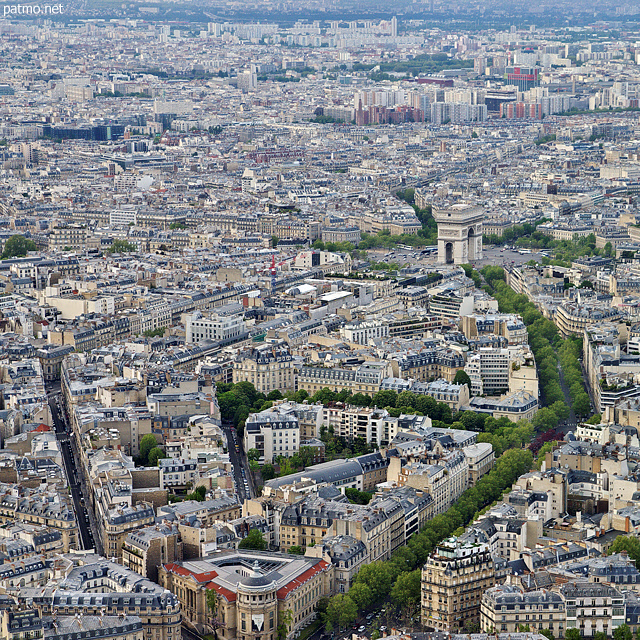 Photograph of Arc de Triomphe and roofs of Paris seen from Eiffel tower