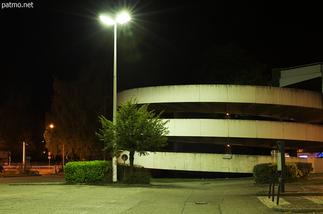 Night light on the spiral parking of Galeries Lafayette in Annecy