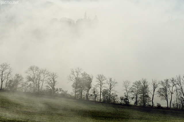 Image of the french countryside in the fog of an autumn morning