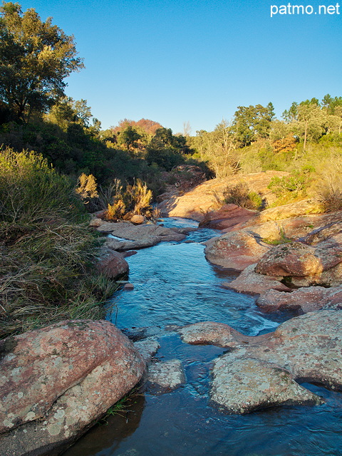 Picture of a winter stream under blue sky in La Plaine des Maures