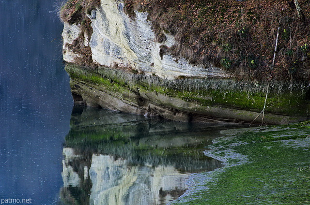 Picture of winter reflections on the water of Rhone river