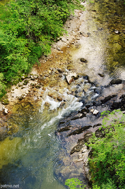 Photograph of springtime colors in Tacon river