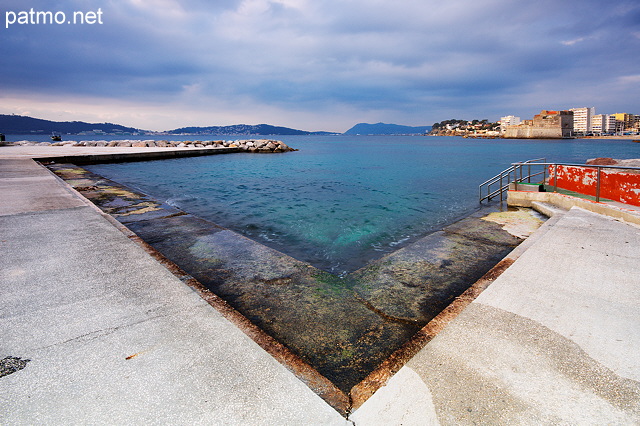 Photograph of Toulon in Provence with dark clous in the sky