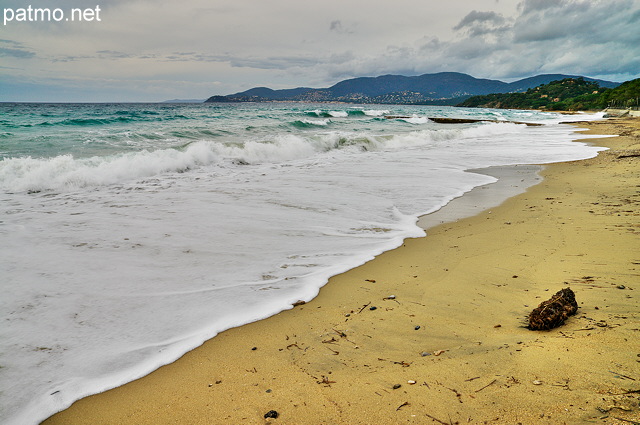 Image of Gigaro beach in Provence with waves and clouds