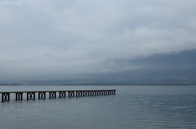 Photograph of Bourget lake under winter morning clouds