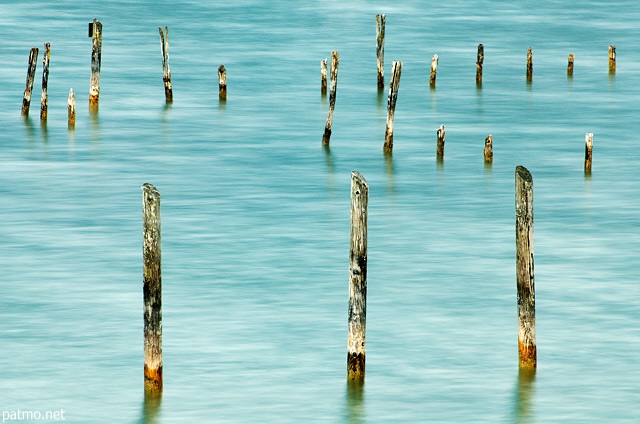 Photograph of poles in Annecy lake at Saint Jorioz