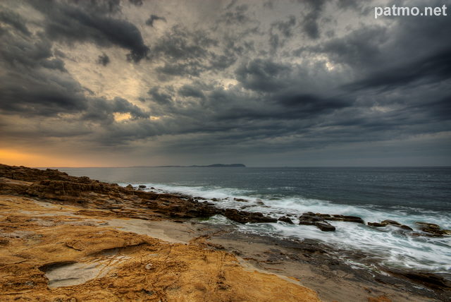 Photo of a stormy dawn on the Mediterranean coast in Provence