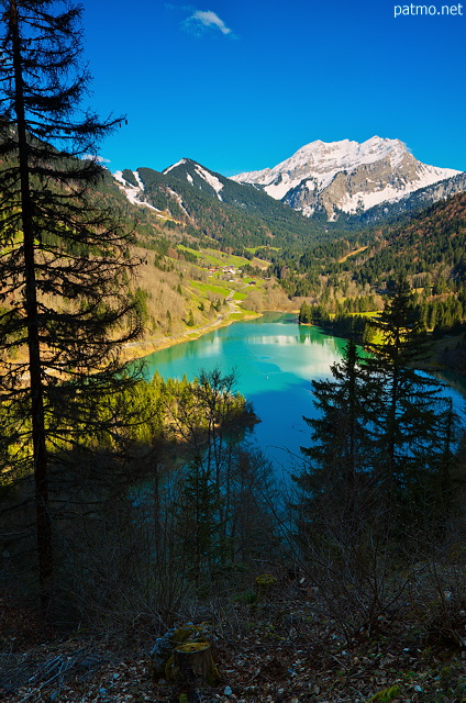 Image of Vallon lake and snow on Roc d'Enfer mountain