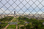 Image of Paris and Champ de Mars seen from inside the Eiffel tower