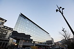 Winter evening light on the Novotel hotel in Annecy