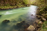 Photo of the wild Valserine river in dusk light