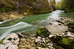 Springtime landscape and powerful flow in Cheran river