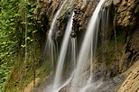 Closeup on a summer waterfall on the banks of Cheran river