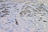 Photographie de l'cume des vagues de l'atlantique sur une plage du Morbihan