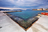 Photograph of Toulon in Provence with dark clous in the sky