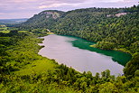 Image of Bonlieu lake under dusk light in french Jura