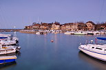 Photo of Nernier village and Geneva lake in dusk light