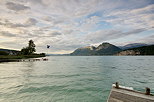 Image of Annecy lake and mountains by a windy summer day in Saint Jorioz