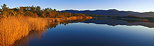 Photographie du coucher de soleil sur le lac des Escarcets dans la Plaine des Maures