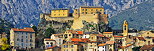 Panoramic view of Corte in Corsica with old houses, citadel and belltower