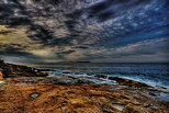 Image HDR des plages du Bau Rouge sous un ciel couvert