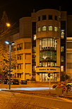 Picture of an office building at night in Annecy