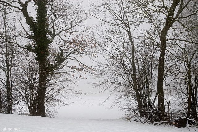Image of the french countryside in winter with fog and snow