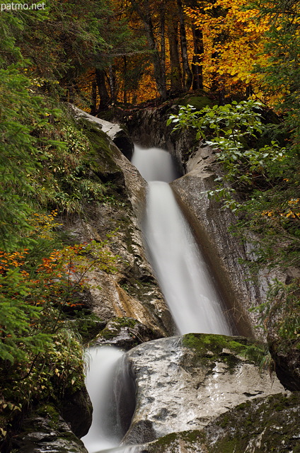 Closeup view of the upper part of Diomaz waterfall in autumn