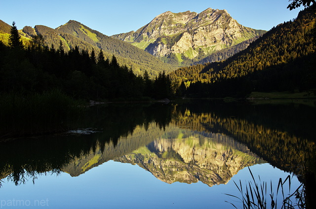 Photograph of lake Vallon and Roc d'Enfer mountain in Bellevaux