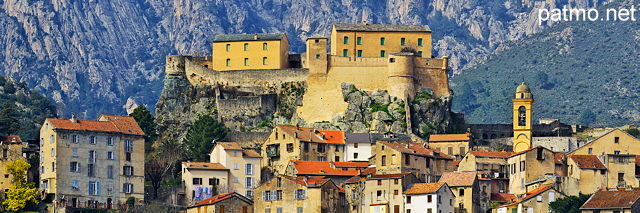 Panoramic view of Corte in Corsica with old houses, citadel and belltower