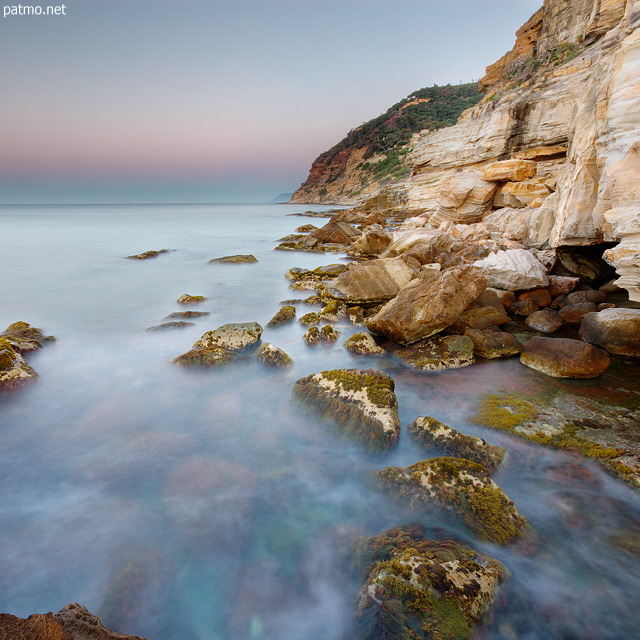 Image of a mediterranean dawn on Bau Rouge beach at Carqueiranne in Provence