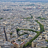 Photograph of Arc de Triomphe and roofs of Paris seen from Eiffel tower