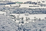 Photographie d'un paysage rural sous la neige à proximité de Frangy en Haute Savoie