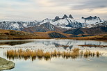 Picture of an autumn evening around lake Guichard with a view on Aiguilles d'Arves mountains