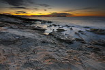 Photo de la plage du Bau Rouge et de la Presqu'île de Giens à l'aube.